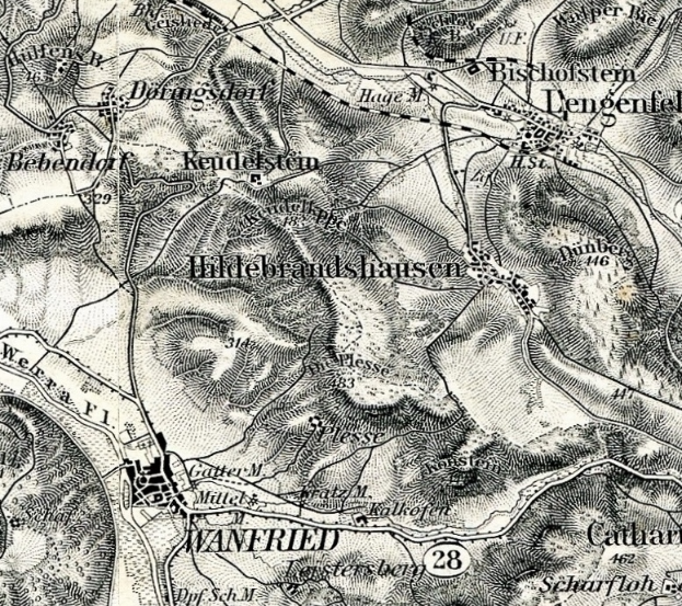Ein altes, detailliertes Stadtplan von Wannfried, Deutschland, mit Straßen, Gebäuden und anderen Merkmalen mit Textbeschriftungen.