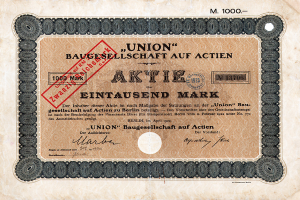 Ein alter deutscher Geldschein mit einem roten Stempel und Text, der darauf hinweist, dass es ein Aktienzertifikat ist.