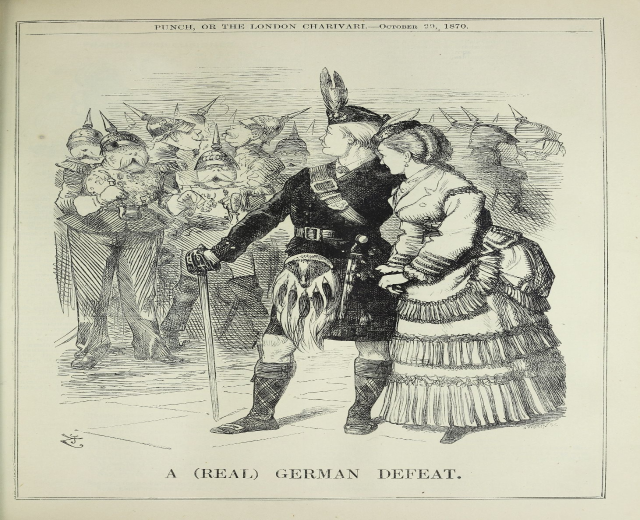 Ein Mann und eine Frau stehen auf einem Papier mit Wörtern und Zahlen, vor einer Menge, wobei der Mann einen Stock hält.